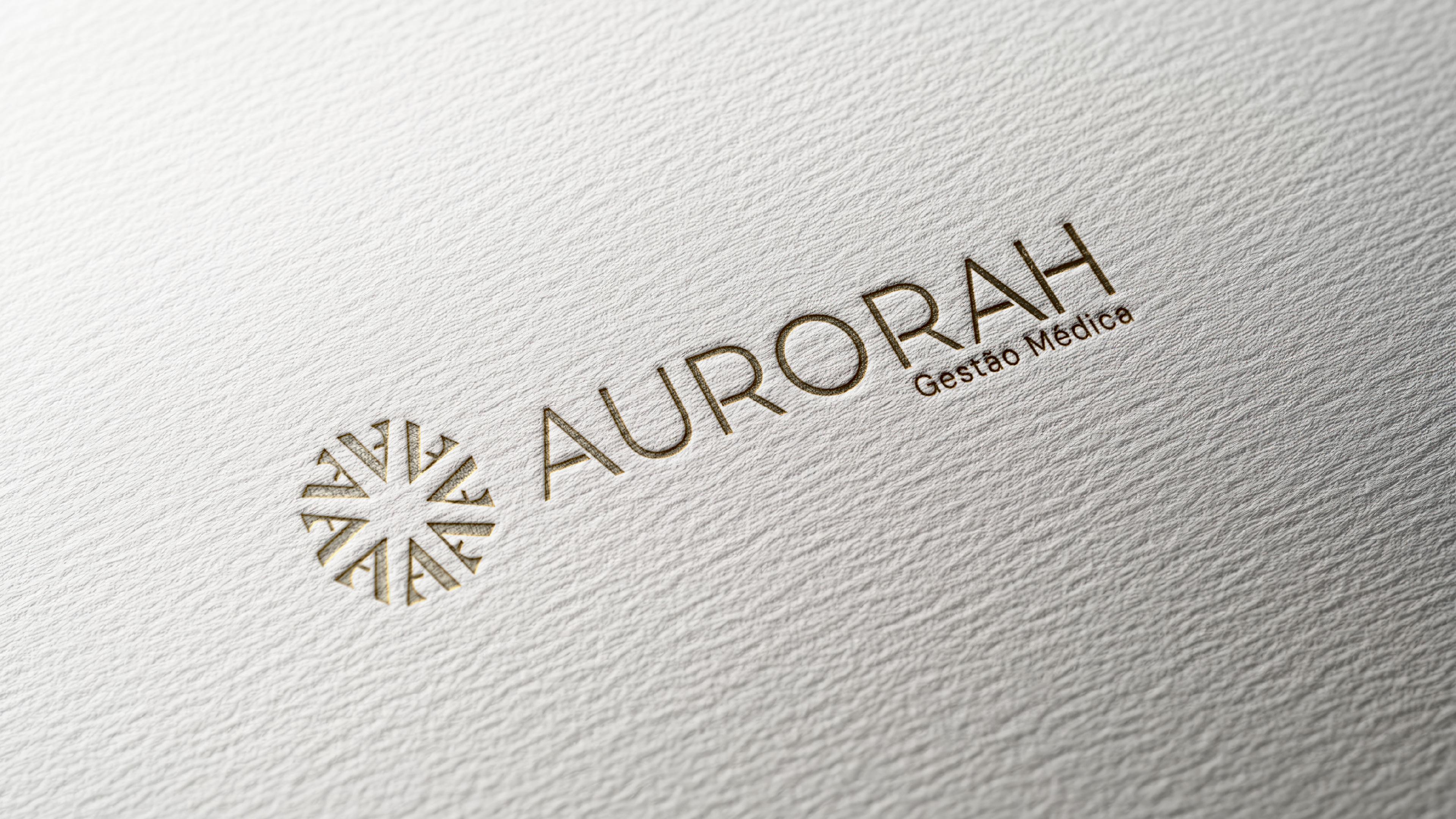 Logo Aurorah embossado em papel